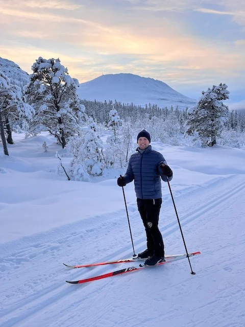 Cross-country skier with Gausta in the background